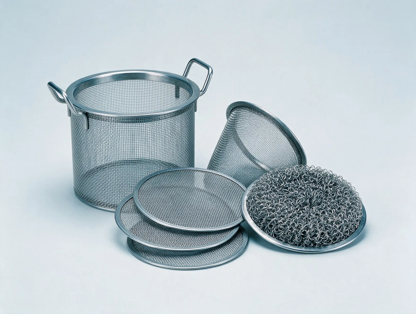 Fabricated wire mesh products: a filter basket, filter discs, a cone strainer and a demister pad